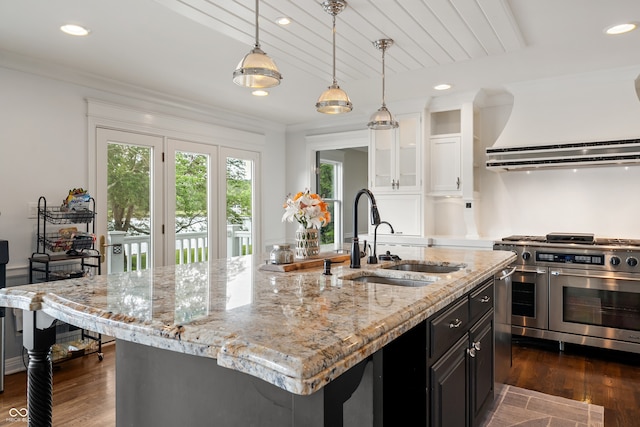 4443 Mallard Pt, Columbus, IN 47201 - kitchen featuring range with two ovens, white cabinetry, hanging light fixtures, recessed lighting, and dark wood-type flooring