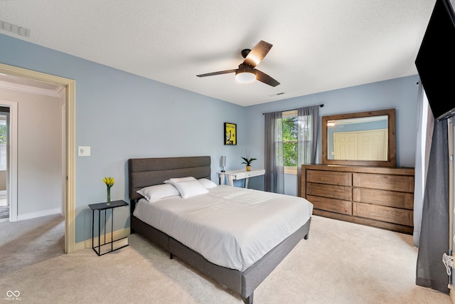 4443 Mallard Pt, Columbus, IN 47201 - bedroom with light colored carpet and ceiling fan