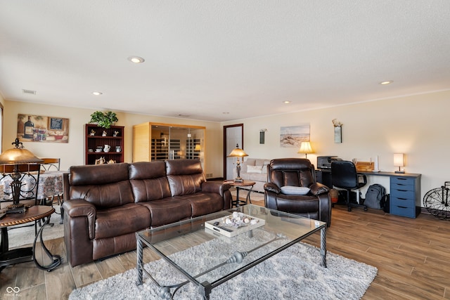 4443 Mallard Pt, Columbus, IN 47201 - living room featuring light wood-style flooring, an office area, and recessed lighting