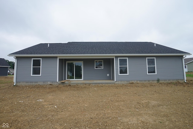 583 Shawnee Trl, Milan, IN 47031 - rear view of house with roof with shingles and a porch