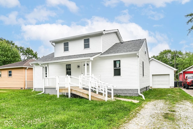 2413 Fowler St, Anderson, IN 46012 - traditional-style house featuring a porch, roof with shingles, driveway, a front yard, and a garage