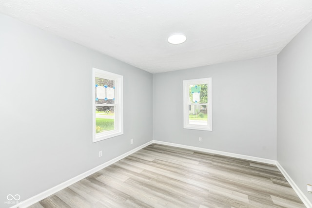2413 Fowler St, Anderson, IN 46012 - spare room with light wood-type flooring and baseboards