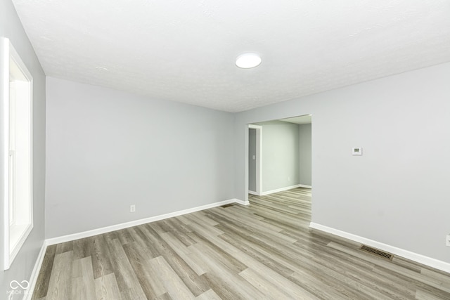 2413 Fowler St, Anderson, IN 46012 - unfurnished room with light wood-style floors and baseboards