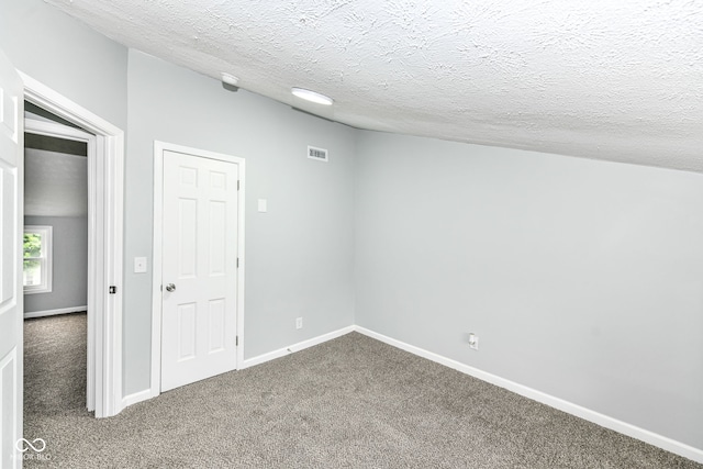 2413 Fowler St, Anderson, IN 46012 - carpeted spare room featuring baseboards and a textured ceiling