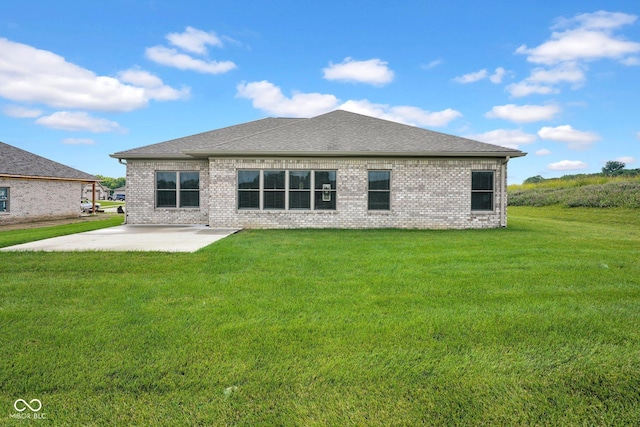 3072 W Glacier Dr, Monrovia, IN 46157 - rear view of property with a patio area, a yard, and brick siding