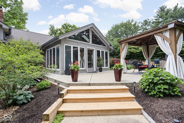 7629 Candlewood Ln, Indianapolis, IN 46250 - rear view of house featuring a gazebo and a patio