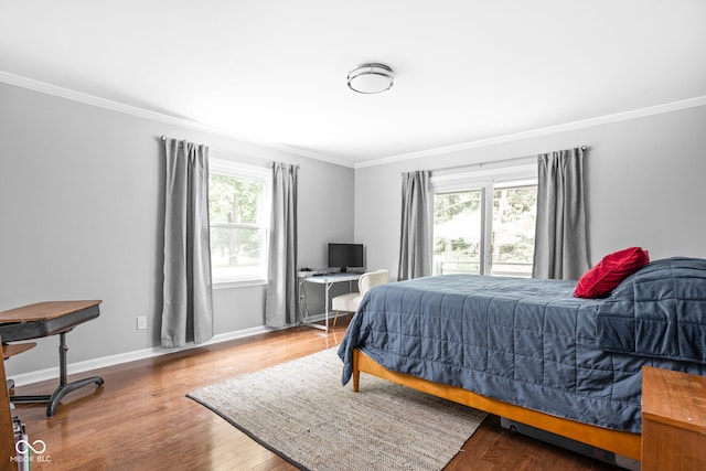 7629 Candlewood Ln, Indianapolis, IN 46250 - bedroom featuring crown molding and wood finished floors