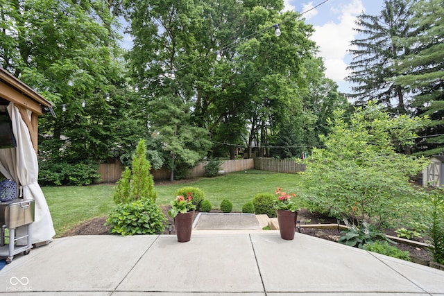 7629 Candlewood Ln, Indianapolis, IN 46250 - fenced backyard with a patio