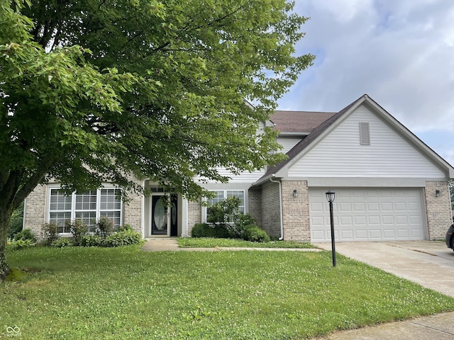 3610 Homestead Pl, Plainfield, IN 46168 - view of front of house with brick siding, concrete driveway, a front lawn, and an attached garage
