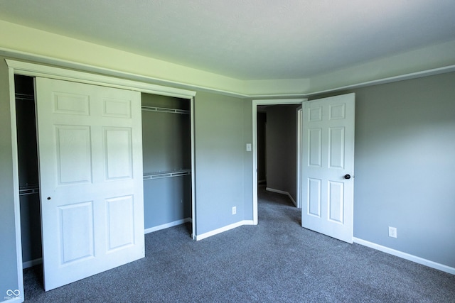 3610 Homestead Pl, Plainfield, IN 46168 - unfurnished bedroom featuring a closet and dark colored carpet