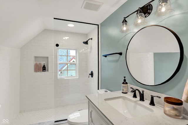 1046 N Hamilton Ave, Indianapolis, IN 46201 - full bathroom featuring vanity, tiled shower, and lofted ceiling