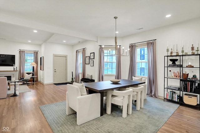 1046 N Hamilton Ave, Indianapolis, IN 46201 - dining room featuring light wood-style flooring, recessed lighting, and a chandelier