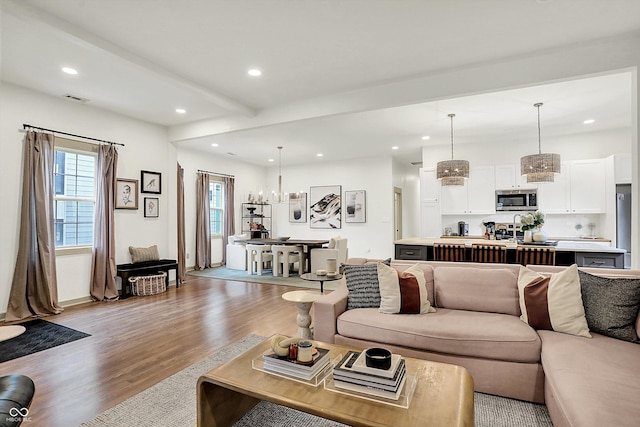 1046 N Hamilton Ave, Indianapolis, IN 46201 - living room featuring light wood finished floors and recessed lighting