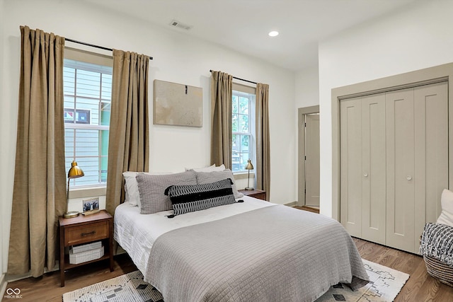 1046 N Hamilton Ave, Indianapolis, IN 46201 - bedroom featuring wood finished floors, a closet, and recessed lighting