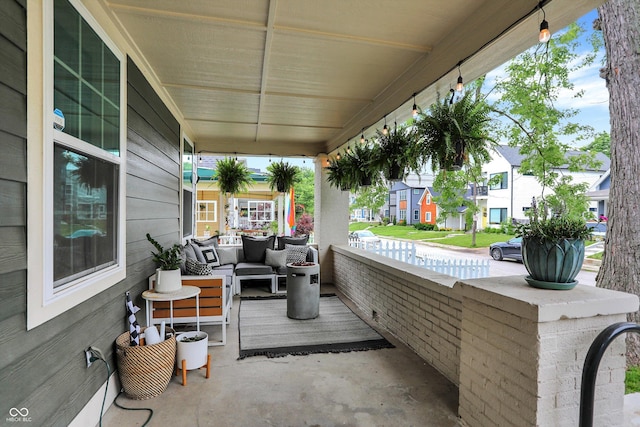 1046 N Hamilton Ave, Indianapolis, IN 46201 - porch with a residential view and an outdoor living space