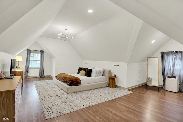 1046 N Hamilton Ave, Indianapolis, IN 46201 - bedroom featuring wood finished floors, vaulted ceiling, and recessed lighting