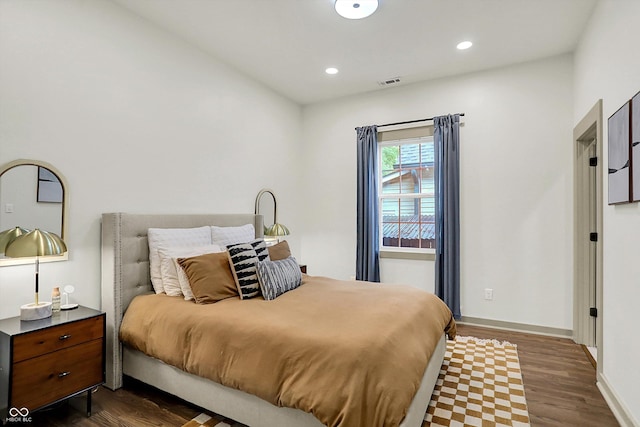 1046 N Hamilton Ave, Indianapolis, IN 46201 - bedroom with dark wood-style floors and recessed lighting