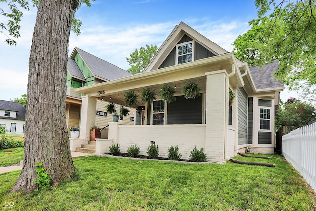 1046 N Hamilton Ave, Indianapolis, IN 46201 - view of front of house with brick siding and roof with shingles