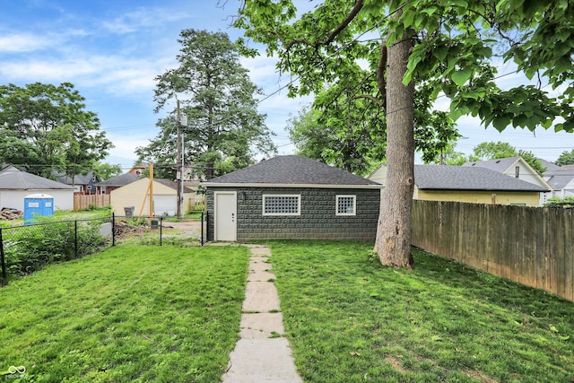 1046 N Hamilton Ave, Indianapolis, IN 46201 - fenced backyard featuring an outbuilding