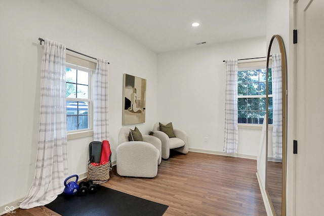 1046 N Hamilton Ave, Indianapolis, IN 46201 - living area with plenty of natural light, wood finished floors, and recessed lighting
