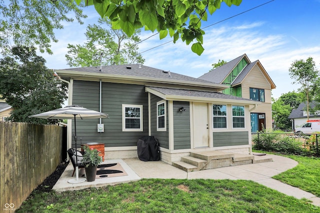 1046 N Hamilton Ave, Indianapolis, IN 46201 - rear view of property featuring a patio area and roof with shingles