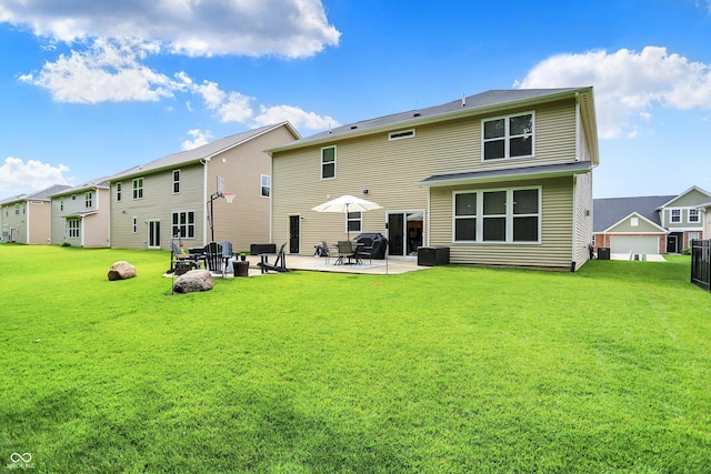 5306 Lavender Dr, Plainfield, IN 46168 - rear view of property with a patio area and a lawn