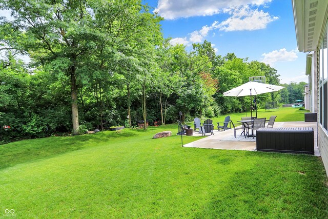 5306 Lavender Dr, Plainfield, IN 46168 - view of green lawn with a patio and view of scattered trees