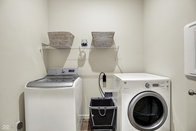 5306 Lavender Dr, Plainfield, IN 46168 - laundry area with washing machine and dryer and baseboards
