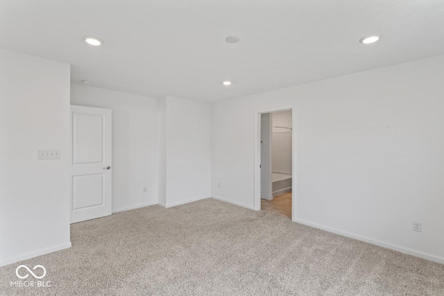 10107 Camp Creek Way, Indianapolis, IN 46229 - empty room with light carpet and recessed lighting