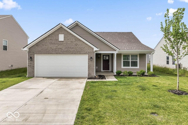 10107 Camp Creek Way, Indianapolis, IN 46229 - view of front of property featuring an attached garage, concrete driveway, a front lawn, and brick siding