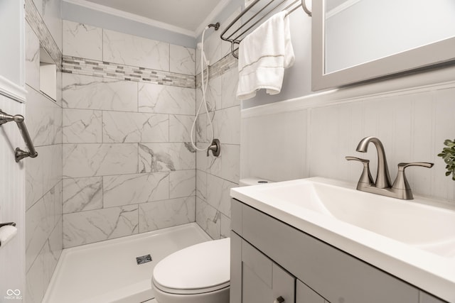 1515 Randall Rd, Indianapolis, IN 46240 - full bath featuring ornamental molding, vanity, tiled shower, and a wainscoted wall
