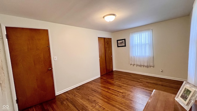 202 Collier St, Columbus, IN 47201 - unfurnished room with wood finished floors and baseboards