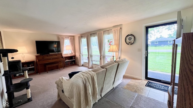 202 Collier St, Columbus, IN 47201 - living area with plenty of natural light and light tile patterned floors