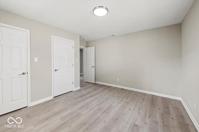 508 W 38th St, Indianapolis, IN 46208 - unfurnished bedroom with wood finished floors