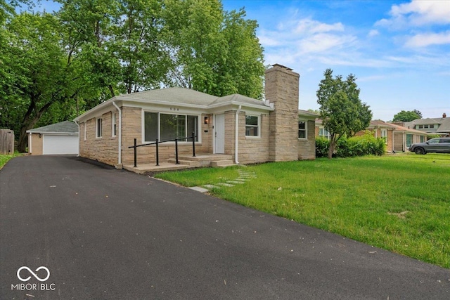 508 W 38th St, Indianapolis, IN 46208 - ranch-style home with a chimney, an outbuilding, a front yard, a garage, and stone siding