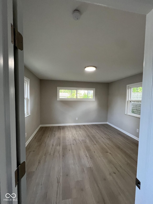 508 W 38th St, Indianapolis, IN 46208 - empty room with wood finished floors and a smoke detector