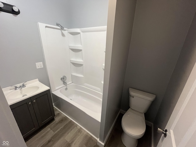 3127 E Lynn St, Anderson, IN 46016 - bathroom with wood finished floors, vanity, and bathtub / shower combination