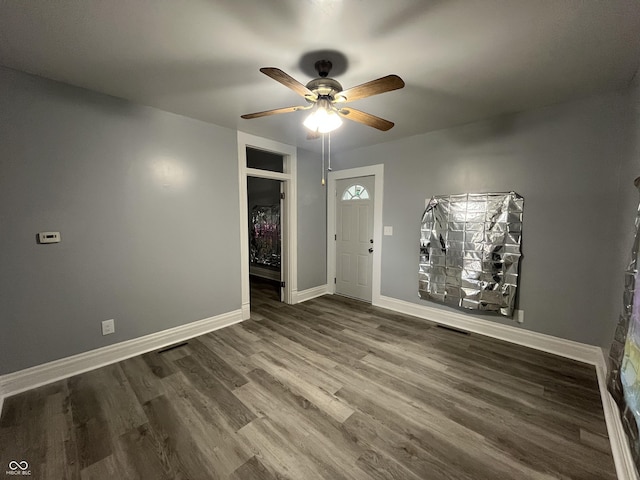 3127 E Lynn St, Anderson, IN 46016 - foyer featuring a ceiling fan and wood finished floors