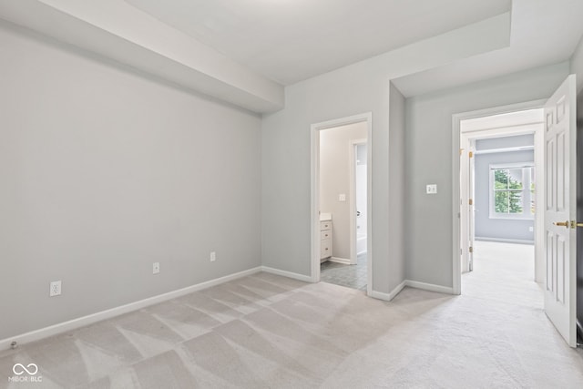 11266 Old Stone Dr, Indianapolis, IN 46236 - unfurnished bedroom with light colored carpet and ensuite bathroom