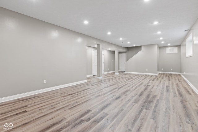 11266 Old Stone Dr, Indianapolis, IN 46236 - finished basement with light wood-type flooring and recessed lighting