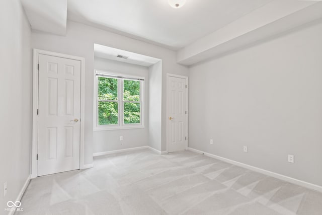 11266 Old Stone Dr, Indianapolis, IN 46236 - unfurnished bedroom featuring light carpet and baseboards