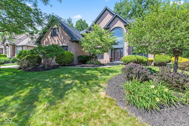 11266 Old Stone Dr, Indianapolis, IN 46236 - view of front of property with brick siding and a front lawn