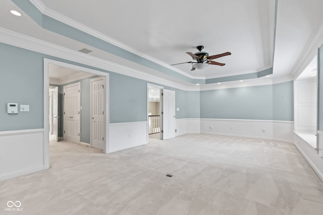 11266 Old Stone Dr, Indianapolis, IN 46236 - spare room featuring crown molding, a ceiling fan, a raised ceiling, light carpet, and recessed lighting