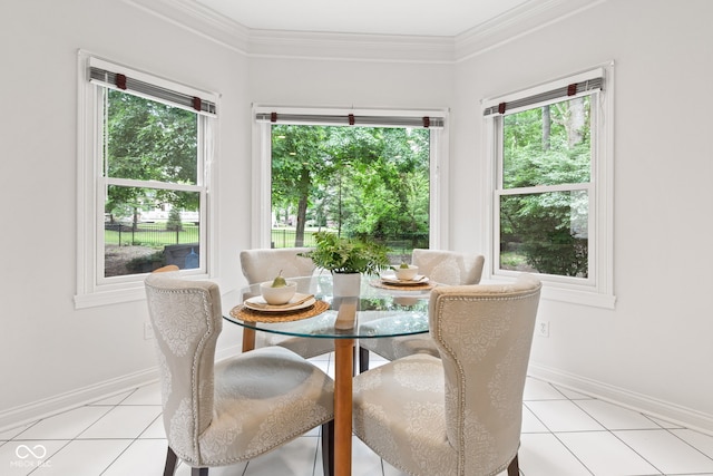 11266 Old Stone Dr, Indianapolis, IN 46236 - dining space featuring light tile patterned floors, healthy amount of natural light, and ornamental molding