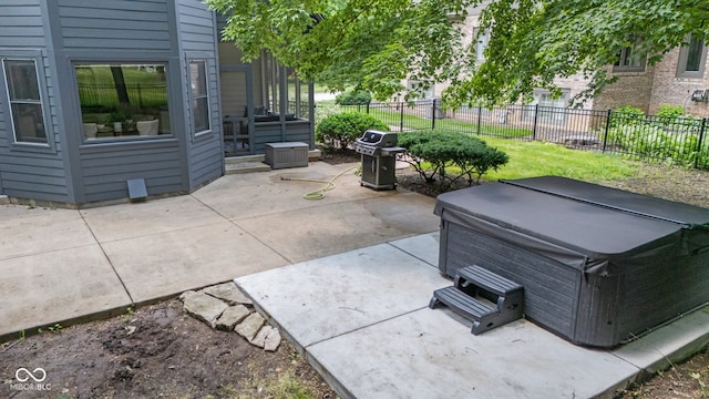 11266 Old Stone Dr, Indianapolis, IN 46236 - view of patio / terrace featuring a hot tub and grilling area