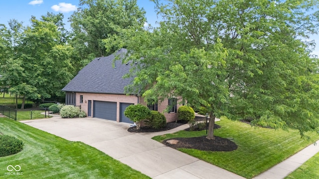 11266 Old Stone Dr, Indianapolis, IN 46236 - obstructed view of property featuring driveway, roof with shingles, an attached garage, and brick siding