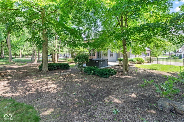 11266 Old Stone Dr, Indianapolis, IN 46236 - view of yard with a covered hot tub