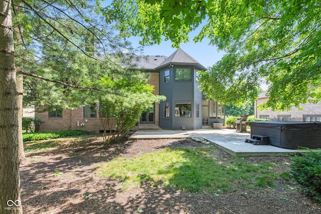 11266 Old Stone Dr, Indianapolis, IN 46236 - rear view of property with a hot tub, a patio, and french doors