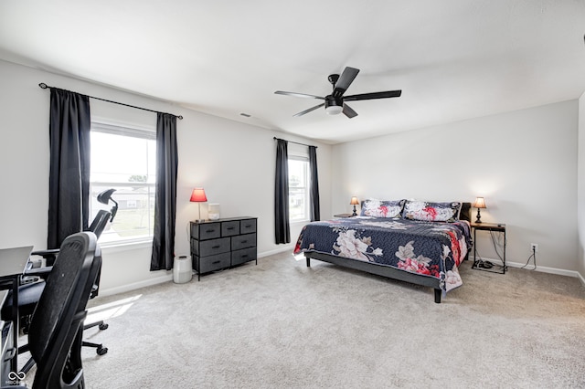 6332 Card Blvd, Indianapolis, IN 46221 - bedroom with carpet floors, a desk, and a ceiling fan