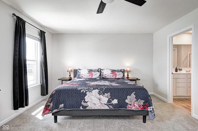 6332 Card Blvd, Indianapolis, IN 46221 - bedroom featuring multiple windows, carpet flooring, ceiling fan, and ensuite bath